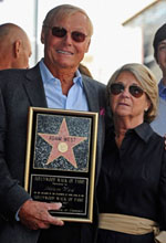 Adam West and Marcelle Tagand Lear