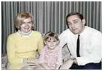 Collette  MacDonald with husband and daughter