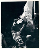 Darryl Dawkins smashing a backboard