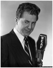 Don Pardo with a microphone