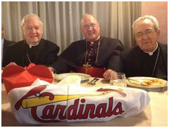 Cardinals Egan, Dolan and Justin Rigali with a Cardinals Baseball uniform