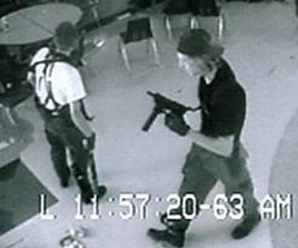 video surveilance of Eric Harris and Dylan Klebold holding guns