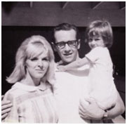 George Carlin with his wife and child