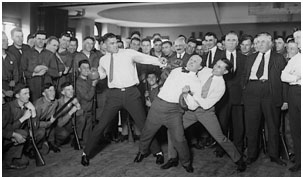 Henry Houdini getting punched by Jack Dempsey