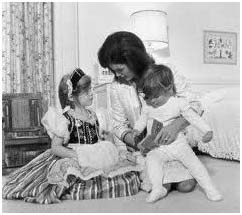 Jacqueline Kennedy Onassis with her children, Caroline and John