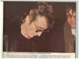 John Lennon signing autographs
