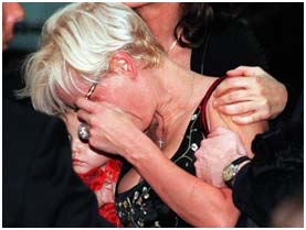 Michael Hutchence family crying at a memorial service