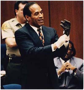 O.J. Simpson Trying on Glove