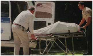 Phil Hartman's body being put in ambulence
