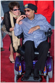 Richard Pryor in a wheel chair