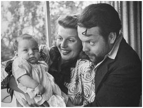 Rita Hayworth with her husband and baby