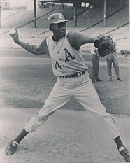 Satchel Paige pitching at age 59