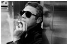 Steve McQueen smoking a cigarette