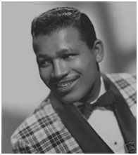 Sugar Ray Robinson wearing a colorful tuxedo