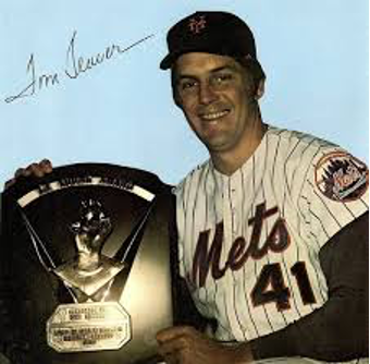 Tom Seaver holding a Cy Young award