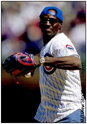 Walter Payton throwing out the first pitch at a Cubs game