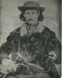 Wild Bill Hickok holding a gun