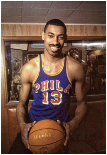 Wilt Chamberlain playing for the Philadelphia Warriors in the NBA