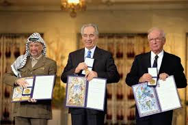 Yitzhak Rabin with Shimon Peres and Yasser Arafat